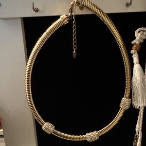 Elegant Gold Necklace with Silver Accents